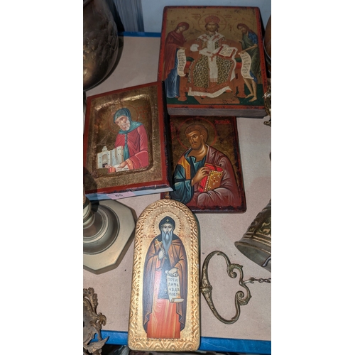 65 - A collection of 20th century Eastern European painted wooden religious Icons