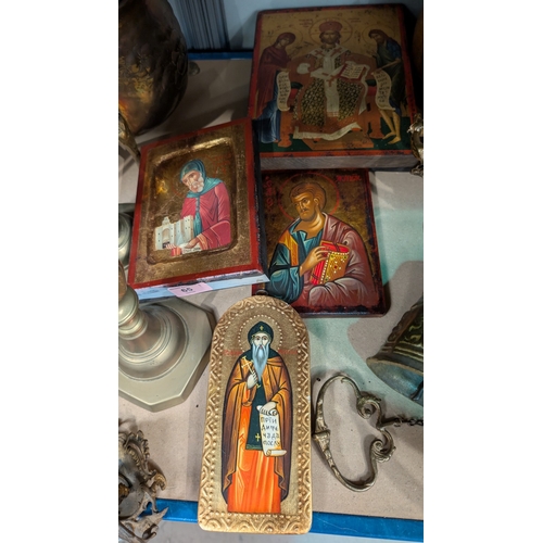 65 - A collection of 20th century Eastern European painted wooden religious Icons