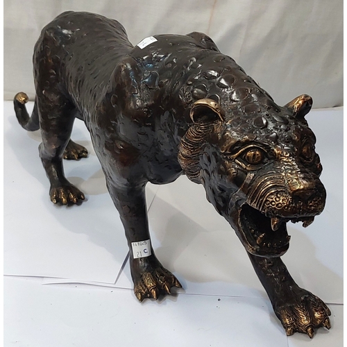 21C - Bronzed sculpture of a big cat in a stalking pose, height 23cm.