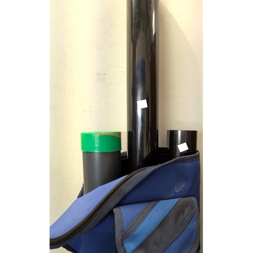 37 - A bag with fishing rods in tubes, various large fishing nets (wood and metal), and a shooting stick....