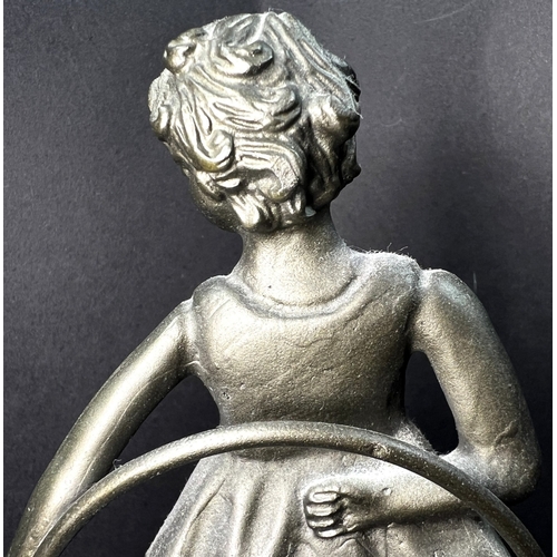 31 - An Art Deco bronzed figure depicting a girl with a hoop, on a two-tier marble stand, height 20cm....