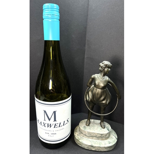 31 - An Art Deco bronzed figure depicting a girl with a hoop, on a two-tier marble stand, height 20cm....