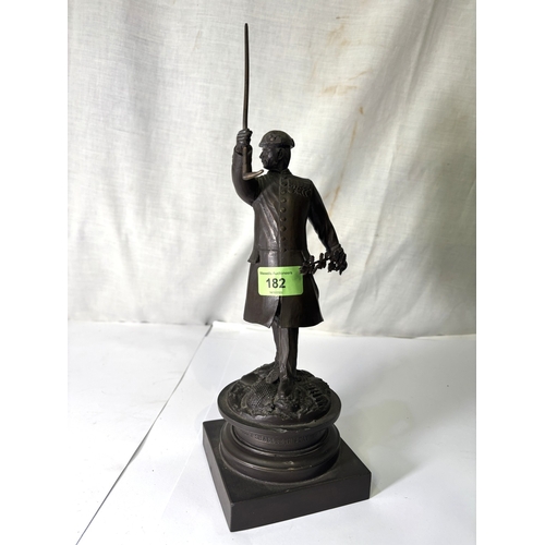 23 - Bronzed sculpture of a historical figure with inscription 