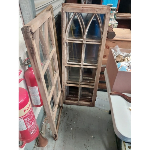 26 - A large cast iron weather vane and three pairs of arched wood framed windows (a.f)...