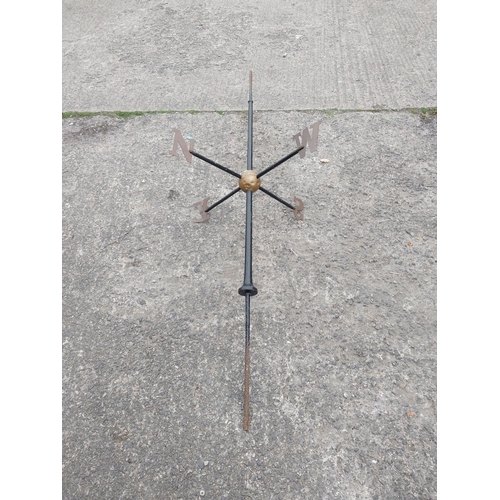 26 - A large cast iron weather vane and three pairs of arched wood framed windows (a.f)...