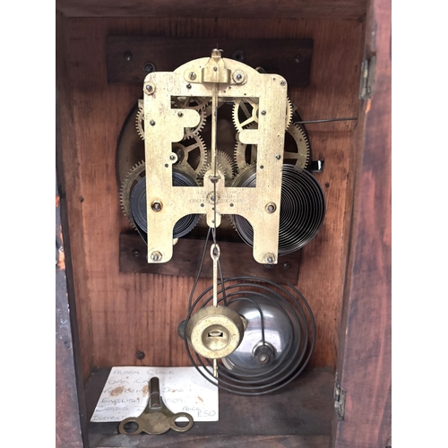 22A - 8 Day Fattorini alarm clock in oak case, silvered dial, with key, circa 1909....