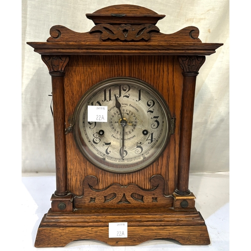 22A - 8 Day Fattorini alarm clock in oak case, silvered dial, with key, circa 1909....