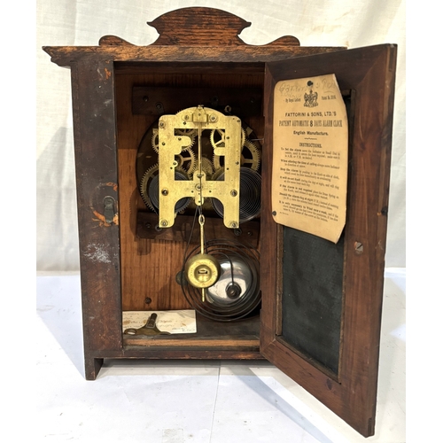 22A - 8 Day Fattorini alarm clock in oak case, silvered dial, with key, circa 1909....