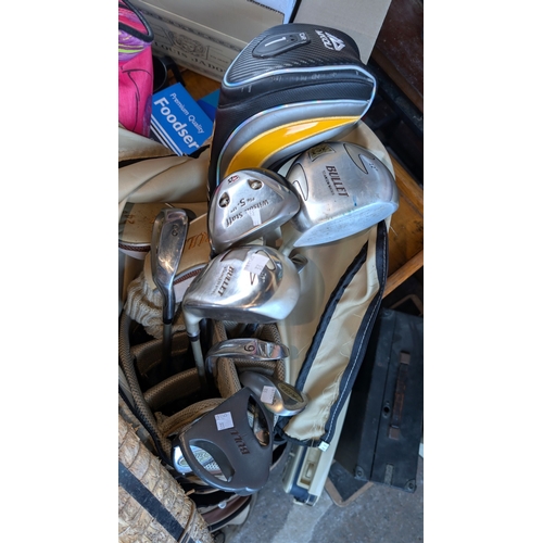 52A - A selection of Bullet and other golf clubs. (Both sets are Ladies golf clubs)....