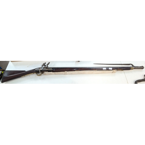 An 18th century style Brown Bess type flintlock rifle with socket ...