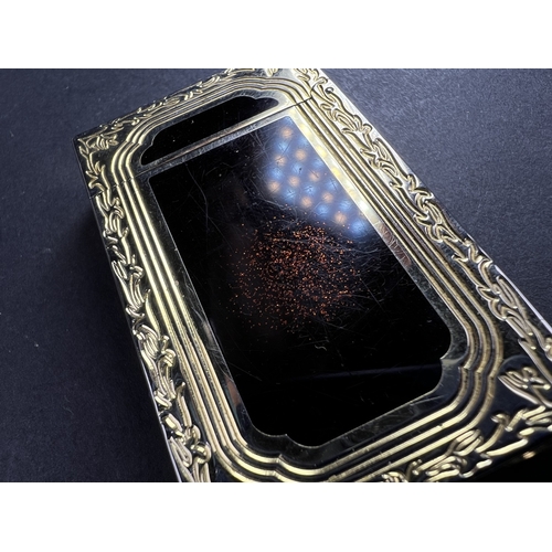 18A - A Dupont lighter with associated booklet...