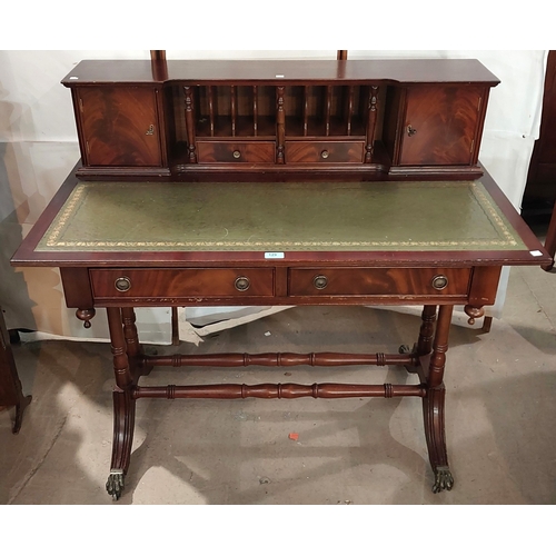 A Reproduction mahogany ladies' writing desk, the raised back with end ...