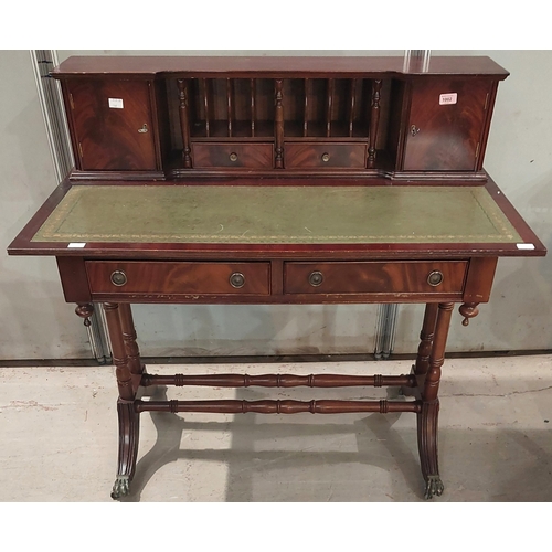 A Reproduction mahogany ladies' writing desk, the raised back with end ...
