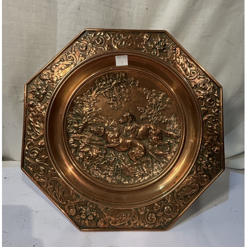 60 - A 19th century shallow copper dish embossed hunting scene of two dogs octagonal border with dragons ... 
