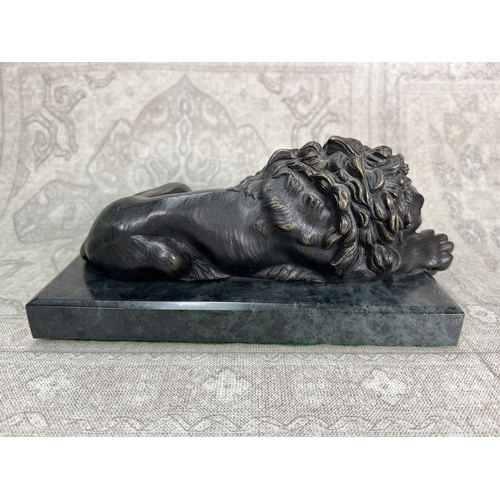 17 - After Canova, a 19th century Italian patinated bronze of Rezzonico Lions, on marble base, length 23c... 