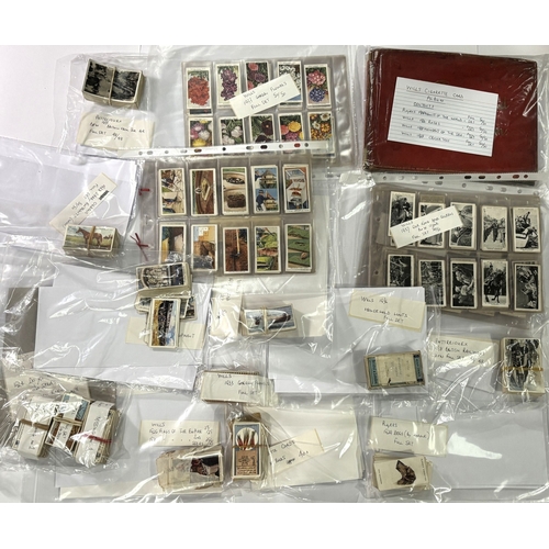 226A - A collection of cigarette cards with Wills card album including Players 1928 Products of the World 5... 
