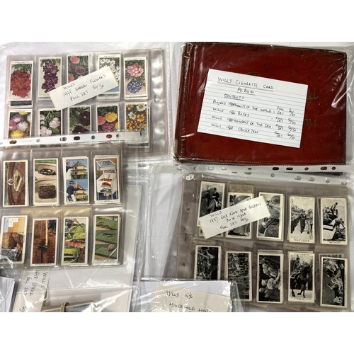 226A - A collection of cigarette cards with Wills card album including Players 1928 Products of the World 5... 