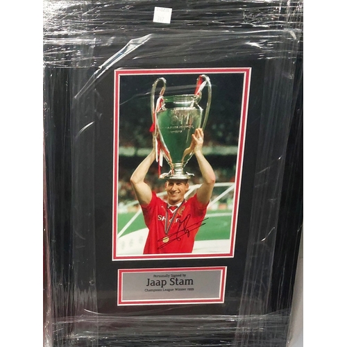247 - 3 signed retro Manchester United shirts and a Jaap Stam signed photo; shirts include Manchester Unit... 