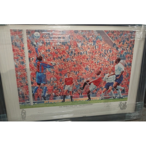 249C - A collection of framed Manchester United pictures including Treble part 1 print signed by Andy Cole;... 