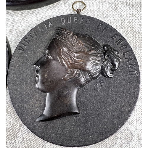 25 - Victoria and Albert portrait plaques in bois durci, diameter 11cm and a larger bust plaque of side p... 
