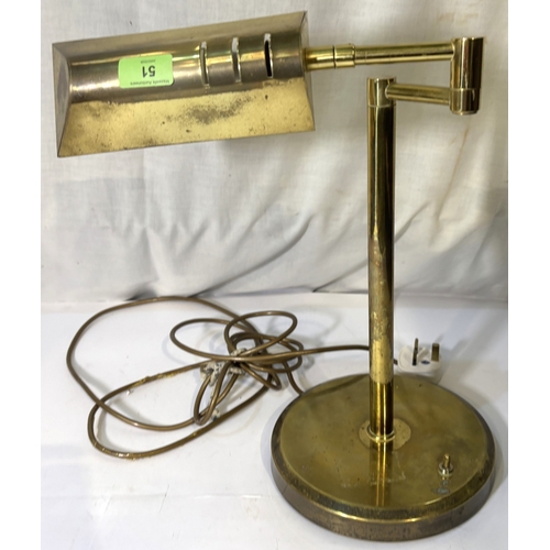 51 - A brass desk lamp, middle Eastern white metal letter opener, desk set etc