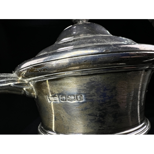 532 - A hallmarked silver twin handled covered trophy cup with circular pedestal base, Sheffield 1923, 13.... 