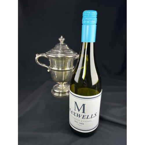 532 - A hallmarked silver twin handled covered trophy cup with circular pedestal base, Sheffield 1923, 13.... 