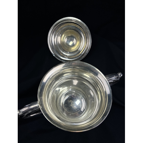 532 - A hallmarked silver twin handled covered trophy cup with circular pedestal base, Sheffield 1923, 13.... 