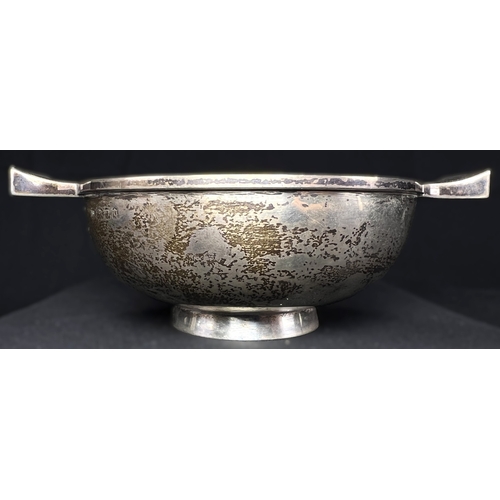 540 - A 2 handled hallmarked silver quaich on circular foot, London 1929, 3.5ozt,
