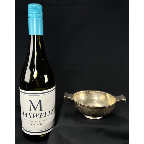 540 - A 2 handled hallmarked silver quaich on circular foot, London 1929, 3.5ozt,