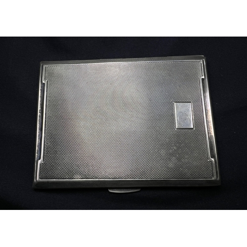 543 - An engine turned hallmarked silver cigarette case, Birmingham 1943, 5.5ozt