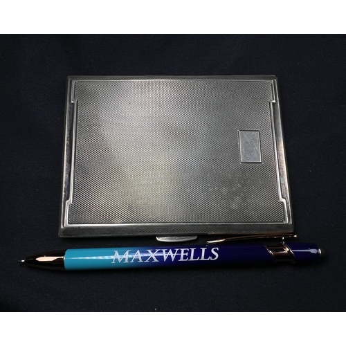 543 - An engine turned hallmarked silver cigarette case, Birmingham 1943, 5.5ozt