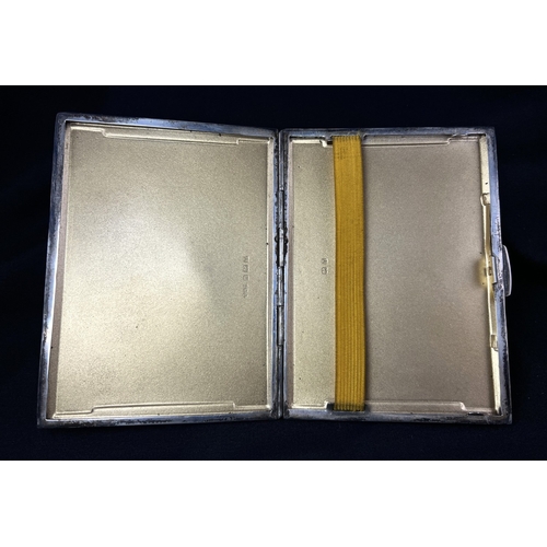 543 - An engine turned hallmarked silver cigarette case, Birmingham 1943, 5.5ozt
