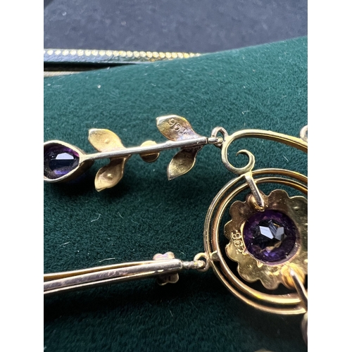 548 - An Art Nouveau pendant set with amethyst and seed pearls, stamped 9c on fine chain (pendant approx. ... 