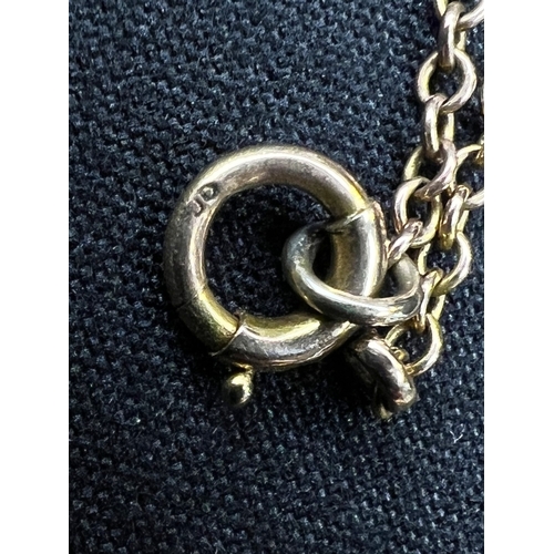 548 - An Art Nouveau pendant set with amethyst and seed pearls, stamped 9c on fine chain (pendant approx. ... 