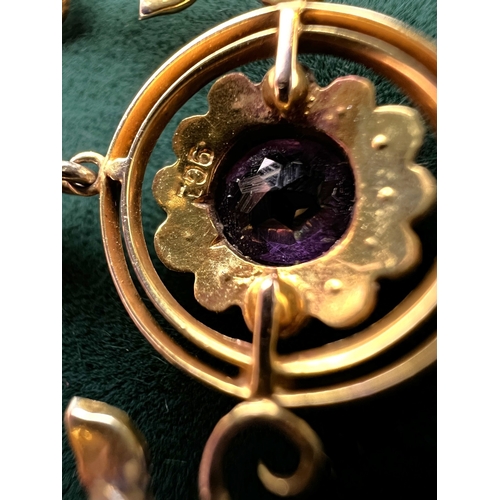 548 - An Art Nouveau pendant set with amethyst and seed pearls, stamped 9c on fine chain (pendant approx. ... 