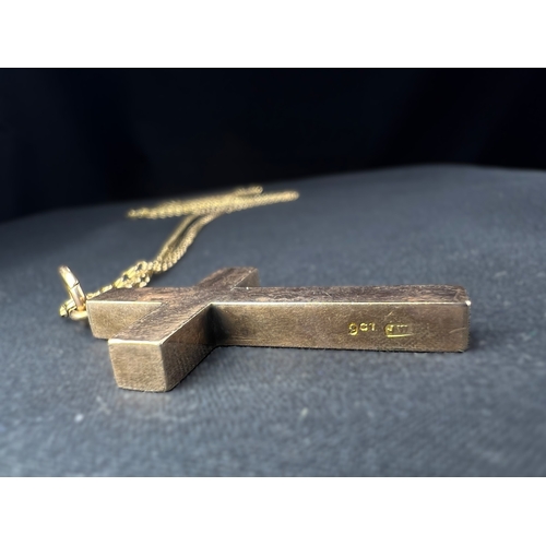 597 - A 9 carat hallmarked gold double link chain with cross stamped '9ct, 8.2gm, chain length 35cm