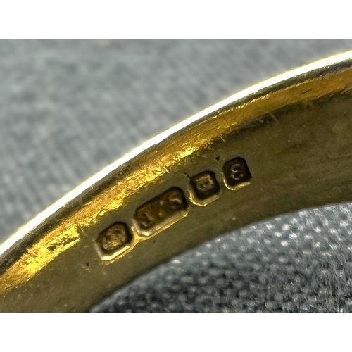 598A - A 9 carat hallmarked gold signet ring set oval black stone, size N, (shank slightly bent), 4.7gm