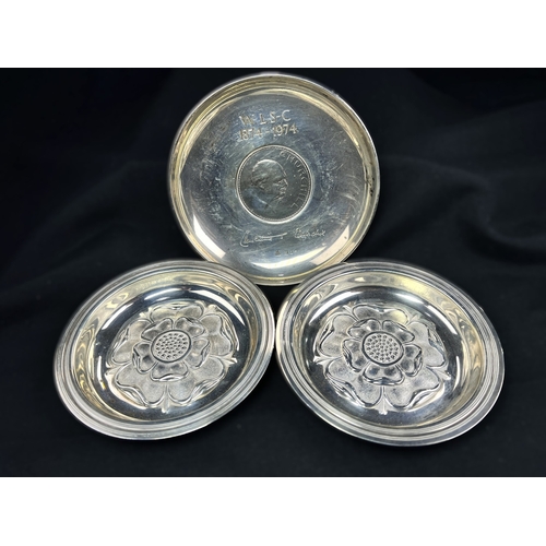 608 - A pair of small circular hallmarked silver dishes each decorated with a rose, London 1926; a small C... 
