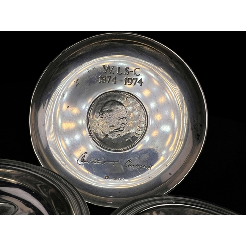 608 - A pair of small circular hallmarked silver dishes each decorated with a rose, London 1926; a small C... 