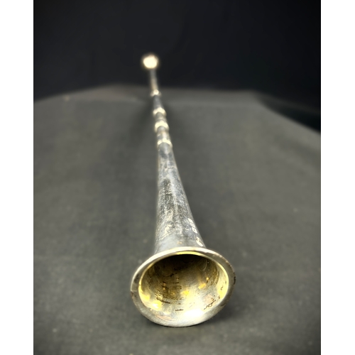 612 - A slender hallmarked silver hunting horn, London 1927, length 31cm