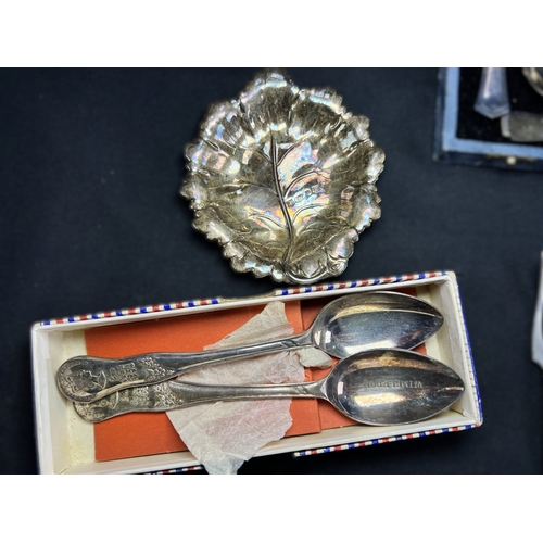 617 - A cased set of 6 hallmarked silver teaspoons by Liberty, Birmingham 1921, with amethyst 'bean knops'... 