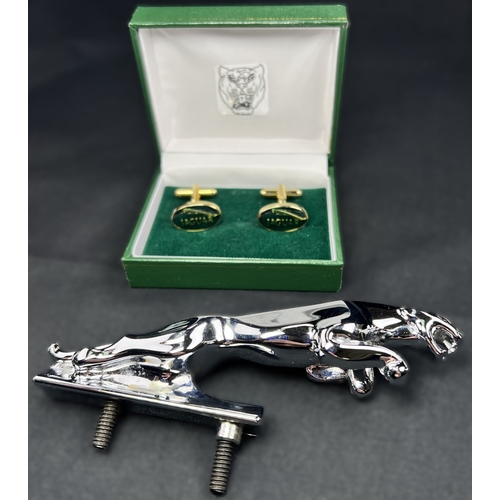 62 - A chrome Jaguar car mascot and a pair of boxed Jaguar cufflinks