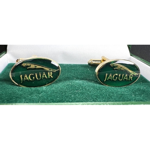 62 - A chrome Jaguar car mascot and a pair of boxed Jaguar cufflinks