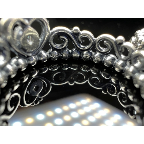 627 - Four silver Pandora rings, 3 with clear stones, sizes J & K, 11.7 gms.