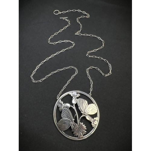 628B - GEORG JENSEN: a silver Moonlight Blossom pendant designed by Arno Malinowski depicting 2 butterflies... 
