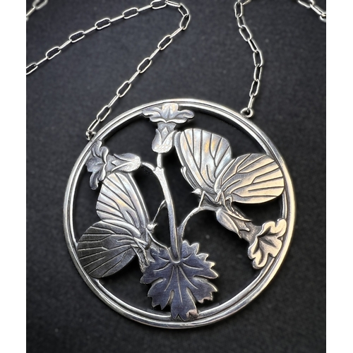 628B - GEORG JENSEN: a silver Moonlight Blossom pendant designed by Arno Malinowski depicting 2 butterflies... 