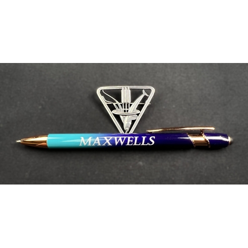 629 - GEORG JENSEN: a triangular silver brooch with dolphin diving through bullrushes, stamped to reverse ... 