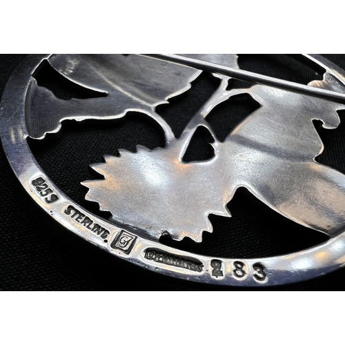 630 - GEORG JENSEN: a circular silver brooch Moonlight Blossom, designed by Arno Malinowski, butterflies p... 