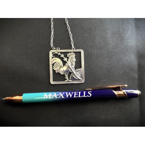 630A - GEORG JENSEN: a square silver pendant with a cockerel and fern, stamped to reverse GJ 925 STERLING D... 